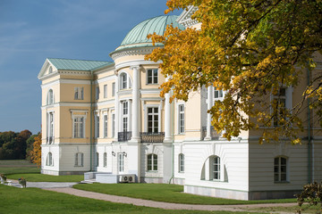 Fototapeta na wymiar The Mezotne Palace - The Pearl of the Latvian Classicism in autumn.