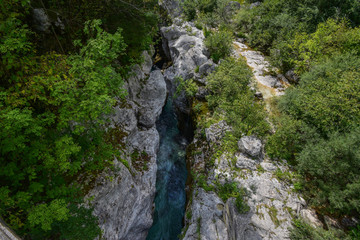 Just above Lepena Valley close to Bovec the Soča (Isonzo) River has carved 750 meters long gorge named Velika Korita. The gorge is completely narrow at some points up to 15 m deep.