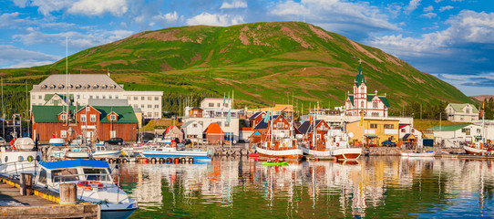 Fishing town of Husavik at sunset, Iceland - obrazy, fototapety, plakaty
