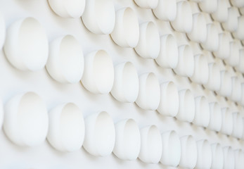 lots of white round plates or cups on white background - texture or background.