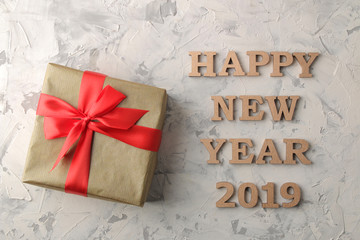 New Year 2019. Christmas. Holidays. Composition with New Year and Christmas gifts and the inscription happy new year