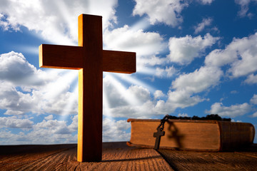 Christian wood cross on blue sky