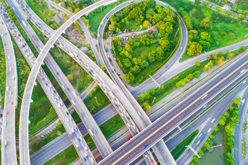 Aerial view of city transport junction road with vehicle