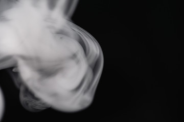 Fototapeta premium Cigarette Smoke On Black Background Detailed Close-Up