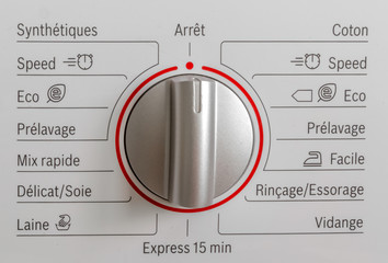 bouton de programmation de machine à laver 