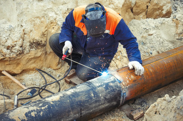 Welding of the pipeline. Process of creation of welding connection by the special mobile tool.