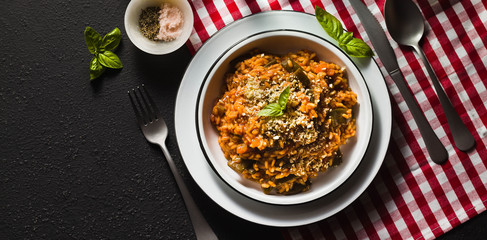 banner of Italian risotto with tomato sauce on the table.
