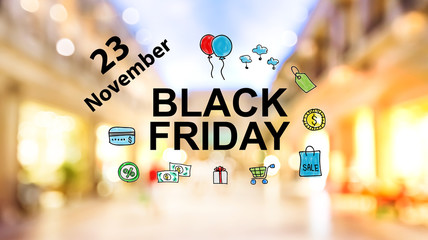 Black Friday November 23 on blurred illuminated shopping mall background