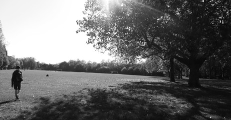 Just before a football game in a park