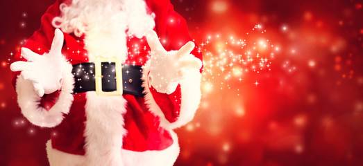 Santa with holding gesture on a shiny light background