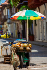 Street sale of coconut water in the walled city of Cartagena de Indias © anamejia18