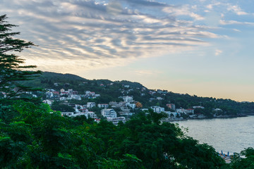 Beautiful bay of Montenegro with perfect sea water of the Adriatic Sea, in the rays of the setting sun.