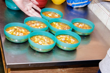 a dish is cooked in the kitchen