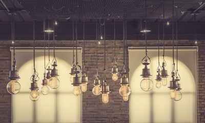 vintage tungsten light with brick wall and window background