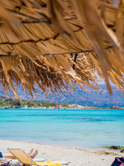 Fototapeta na wymiar Elafonisi, Crete, Greece, a paradise beach with turquoise water, an island located close to the southwestern corner of the Mediterranean island of Crete, known for its pink sand beaches