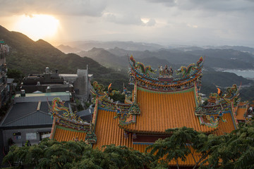 Sunset at Jiufen, Taipei, Taiwan. Chinese Temple in the foreground.