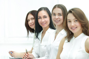 successful business team sitting at the Desk.photo with copy space