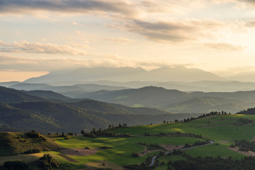 Obraz premium Beautiful sunset over high rocky peaks in High Tatras mountains on Slovak and Polish border.