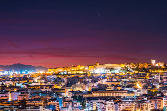 Cagliari at night, capital of the region of Sardinia, Italy. Beautiful skyline image of the big city on the island.