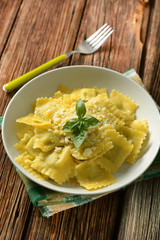 ravioli stuffed with spinach and ricotta with cheese and basil - italian food
