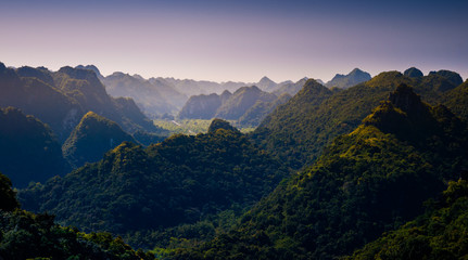 Fototapeta na wymiar Rocks and mountains of Cat Ba Island in Vietnam. Panoramic landscape. Vietnam, South East Asia.