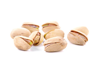 Pistachio nuts on a white background.