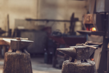 Anvil and hammer in a metal workshop