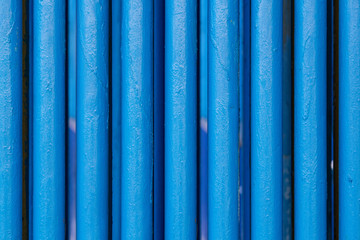 Many old blue pipes. Pipeline used in different industry ways: gas, water or vapor supply. Close up