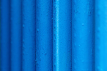 Many old blue pipes. Pipeline used in different industry ways: gas, water or vapor supply. Close up