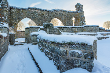 Old monastery ruins with snow