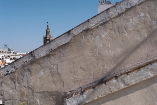 View of la Giralda tower in Seville city from a roof top, Spain