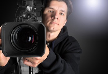 Cameraman working with camera   isolated