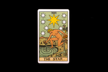 An individual major arcana tarot card isolated on black background. The Star.