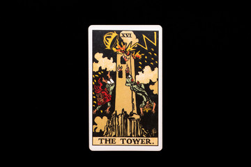 An individual major arcana tarot card isolated on black background. The Tower.
