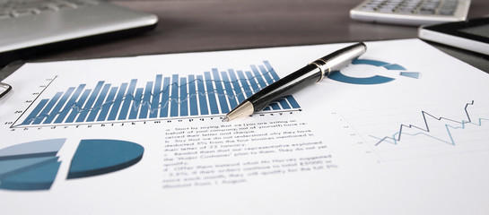 business background. financial report on the table at the businessman