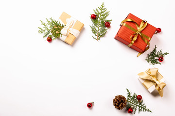 Christmas mood concept. Layout composition with traditional festive attributes, green decorative fresh pine tree branches. Winter holidays season. Background, copy space, close up, top view, flat lay.