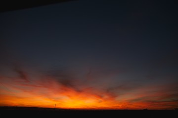 Beautiful and colorful sunset with clouds. Beautiful background