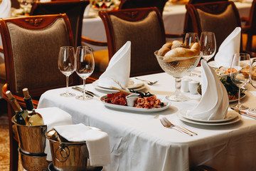 Table setting for dining at a high end wedding..