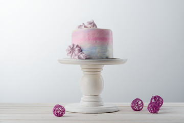Cake, meringues and wire balls
