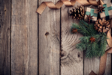 Christmas decorations on old wooden background