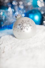 White Christmas Bauble on the Fake Snow