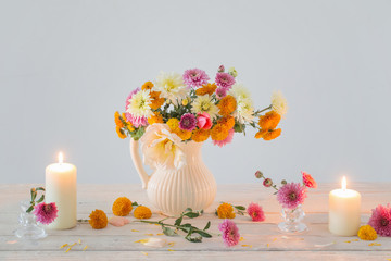 still life with  chrysanthemum and candles