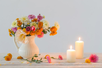 still life with  chrysanthemum and candles