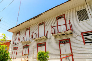 Old, warped, white, wooden house. Puerto Plata, Dominican Republic.