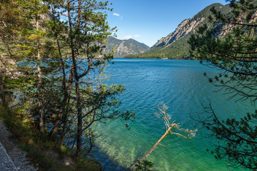 Fototapeta na wymiar On the shore of the lake Plansee in Austria