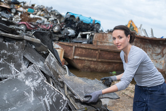female worker at the junkyard