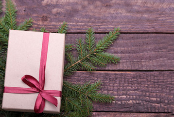 Obraz premium Christmas gifts. Christmas decoration with presents and red ball with fir branches