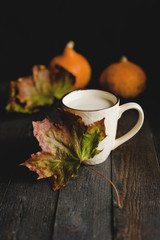 Pumpkin latte, autumn, dark wooden background