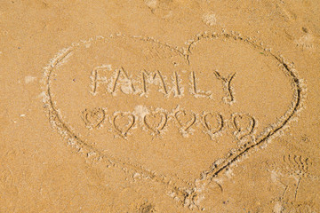 Family love written in the sand