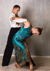 Dancing beautiful couple, indoor  